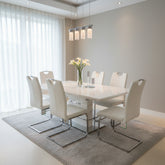 White Milan Extendable Dining Table and Milan Chairs