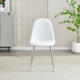 A single white upholstered dining chair with a modern design, featuring a quilted pattern on the back, positioned in a room with a minimalist decor.
