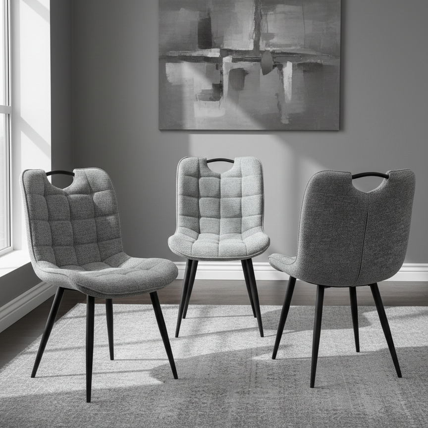 Three gray chairs in a room with abstract art on the wall.
