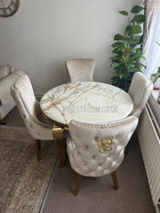 Kata Gold Louis Round Dining Table With Victoria Cream Gold Lion Knocker Chairs