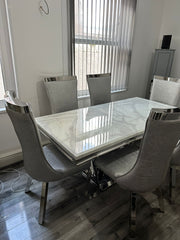 White Charisma Table With Silver Miami Chairs